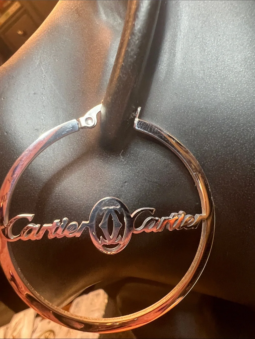 Stainless Steel Silver Hoop Logo Earrings with Subtle Rose Tint